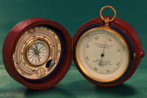 Image of Newton Pocket Barometer Compendium No 1082 in open case with compass and thermometer on left